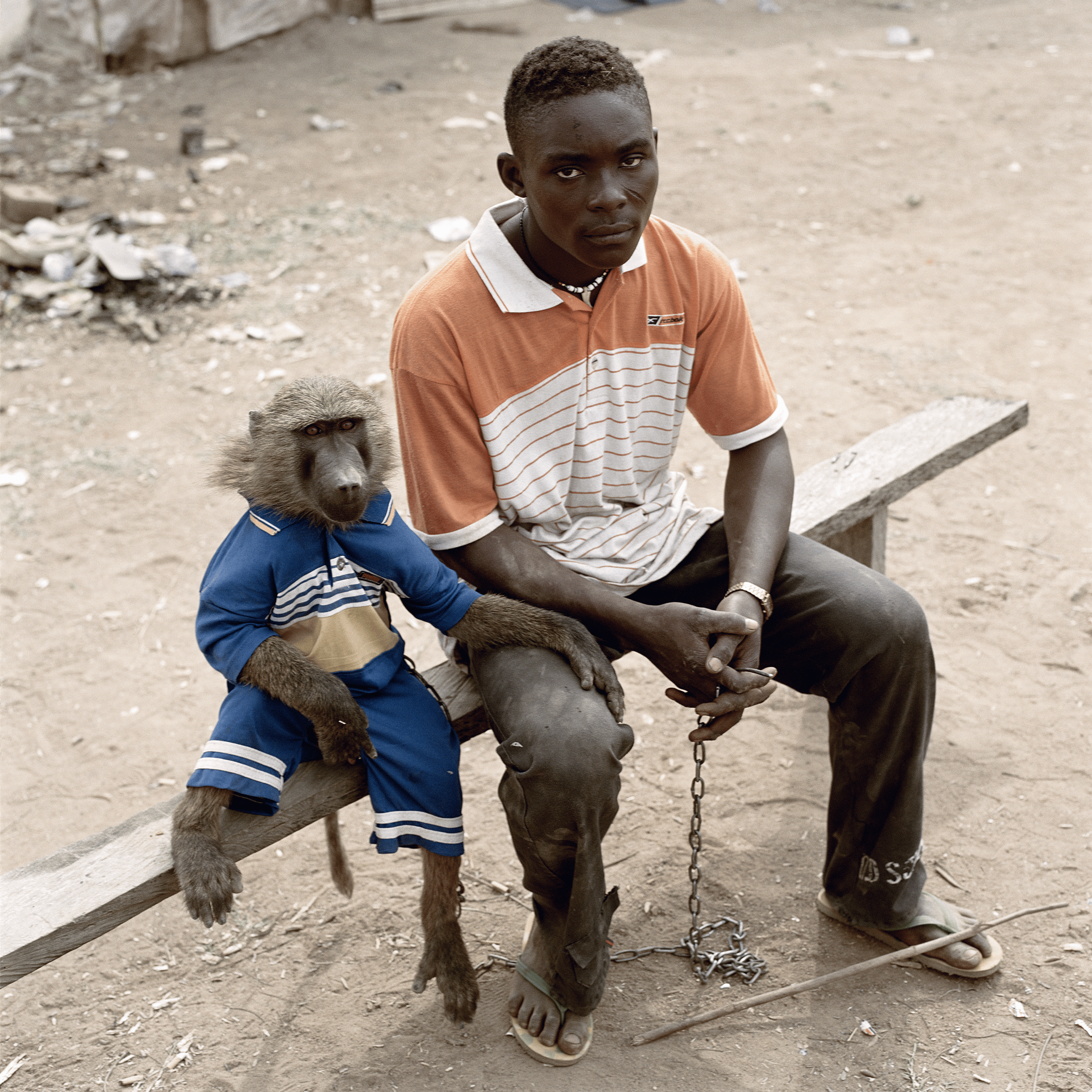 Dayaba Usman with the monkey Clear, Abuja, Nigeria, 2005