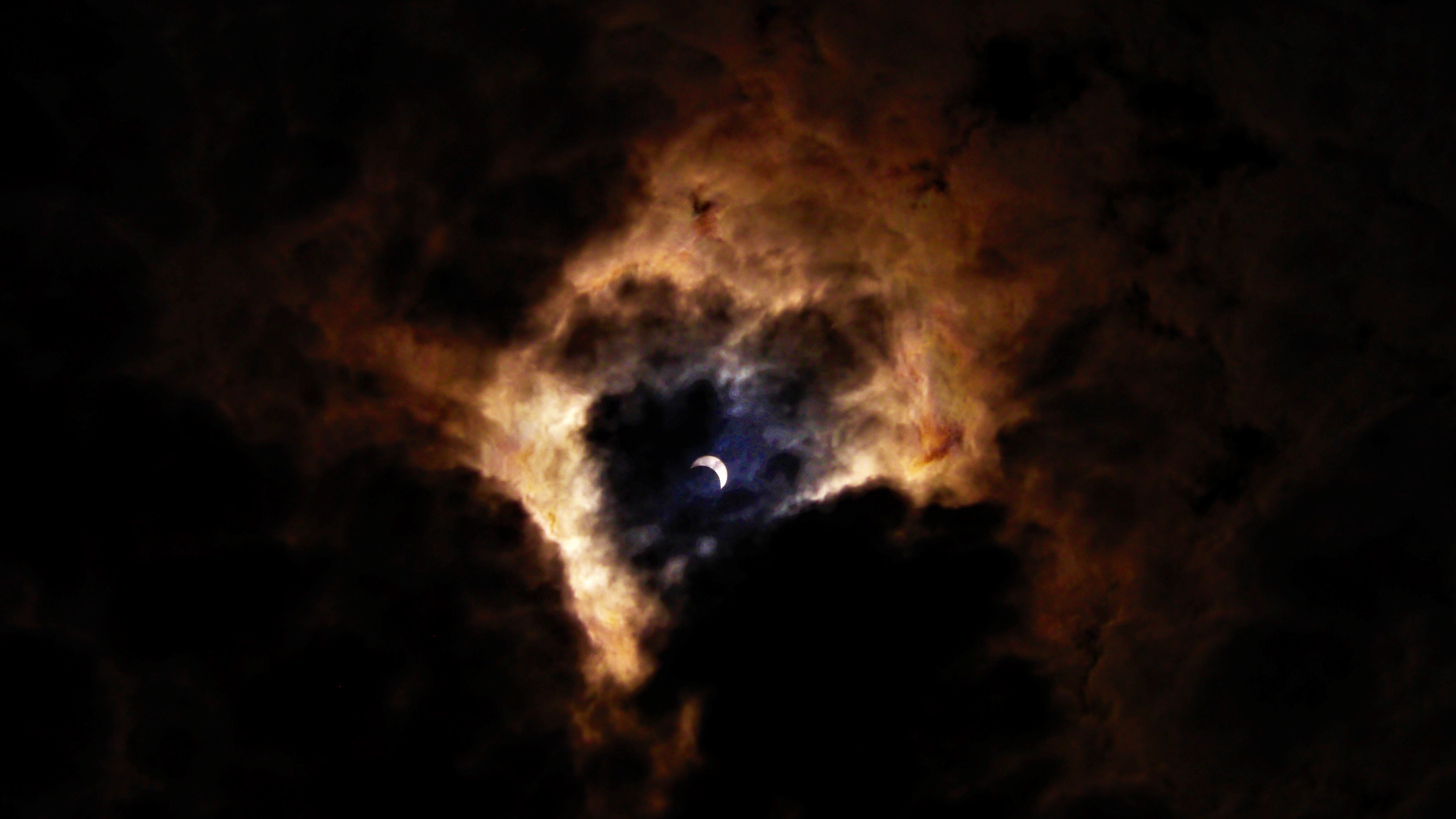 Eclipse in the Clouds