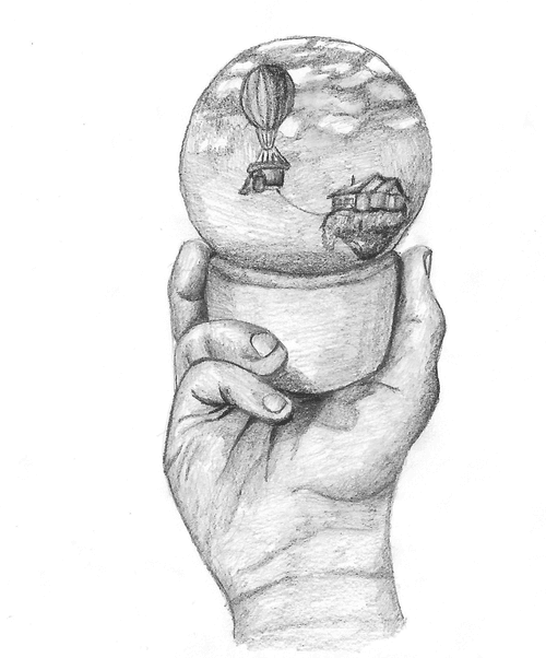 A crystal ball is held in a large hand