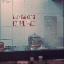 Walking close to the wall collection image