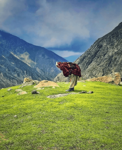 A nomad praying on the top of pir panjal mountain.