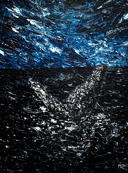 Whale in the sea under the blue sky